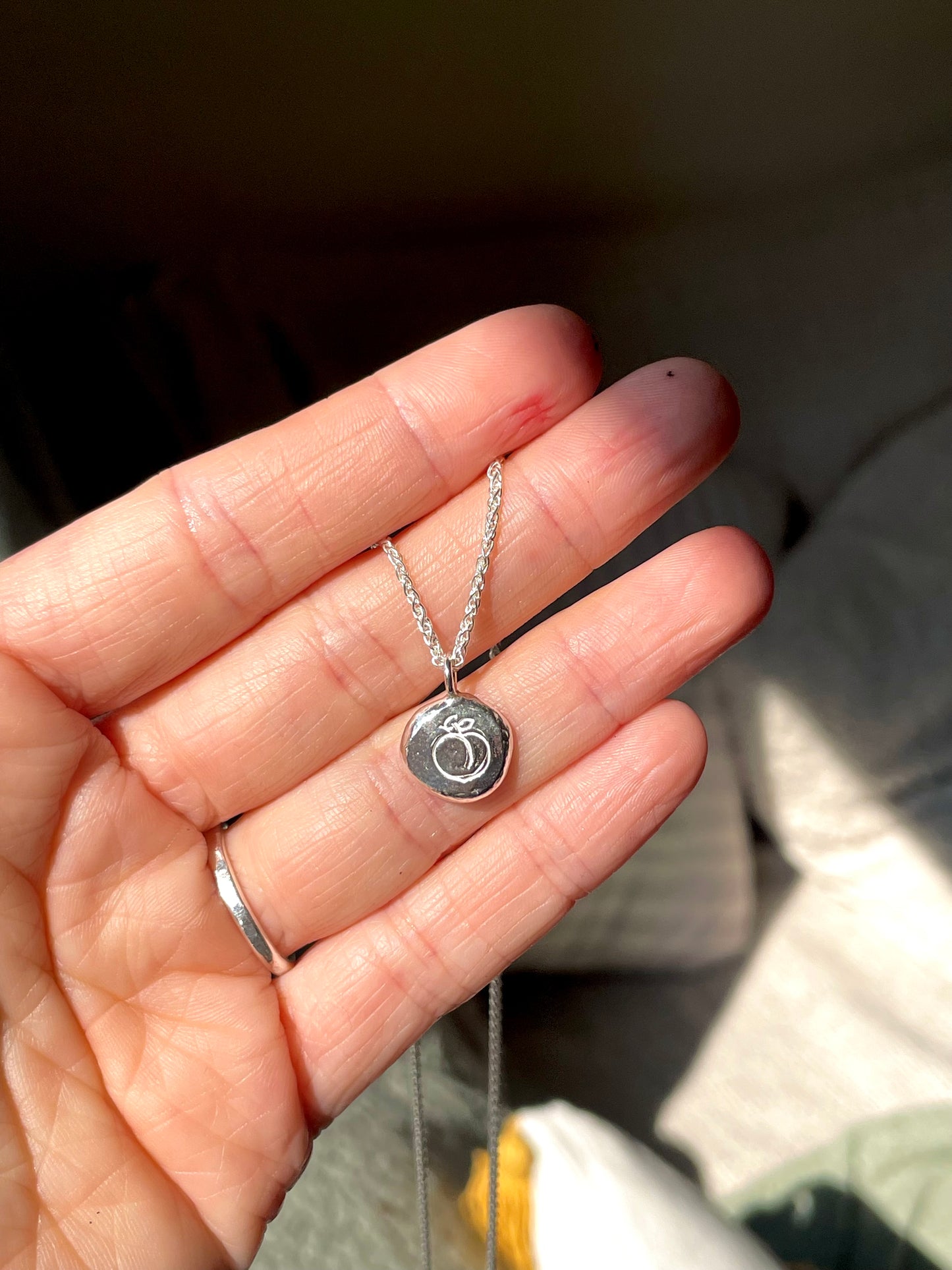 peach | hand stamped silver pebble