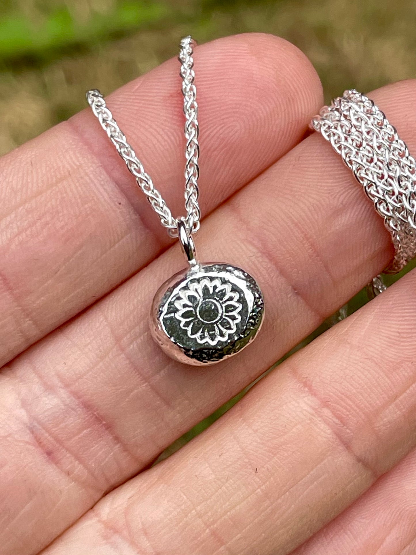 Sunflower | hand stamped silver pebble