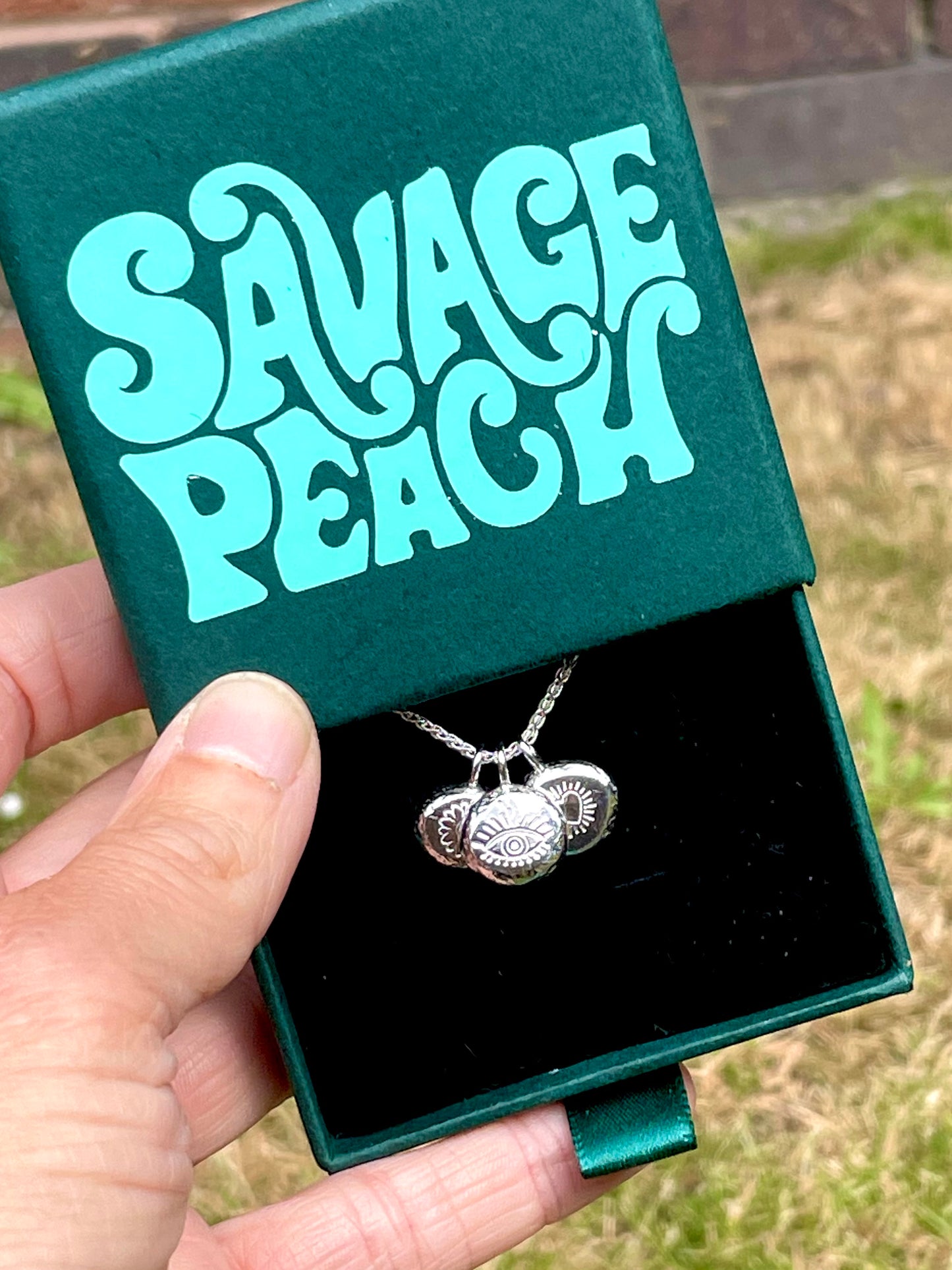 Sunflower | hand stamped silver pebble