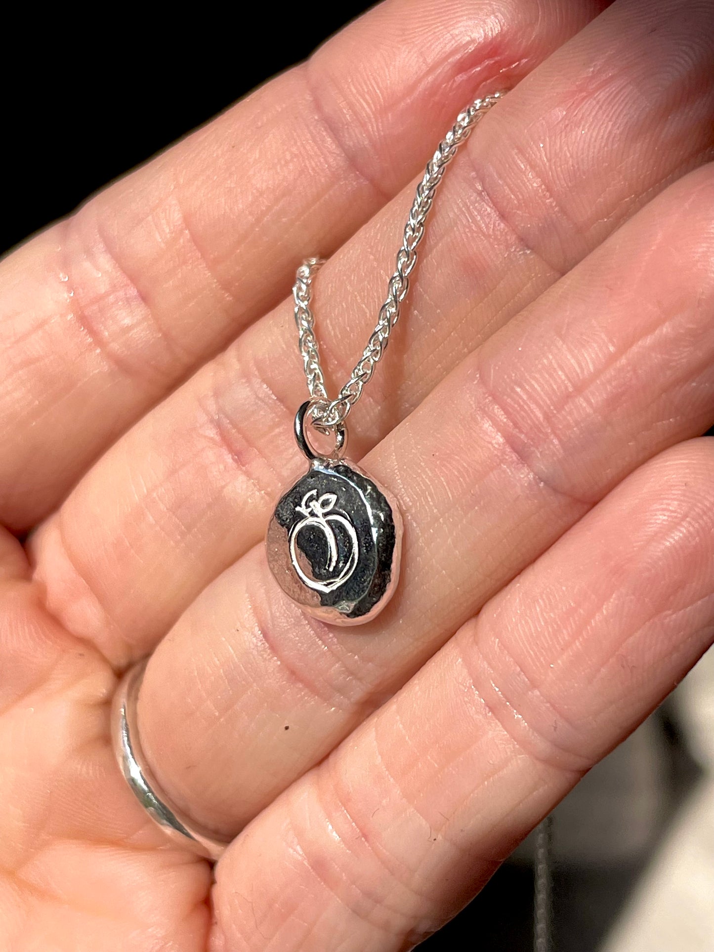 peach | hand stamped silver pebble