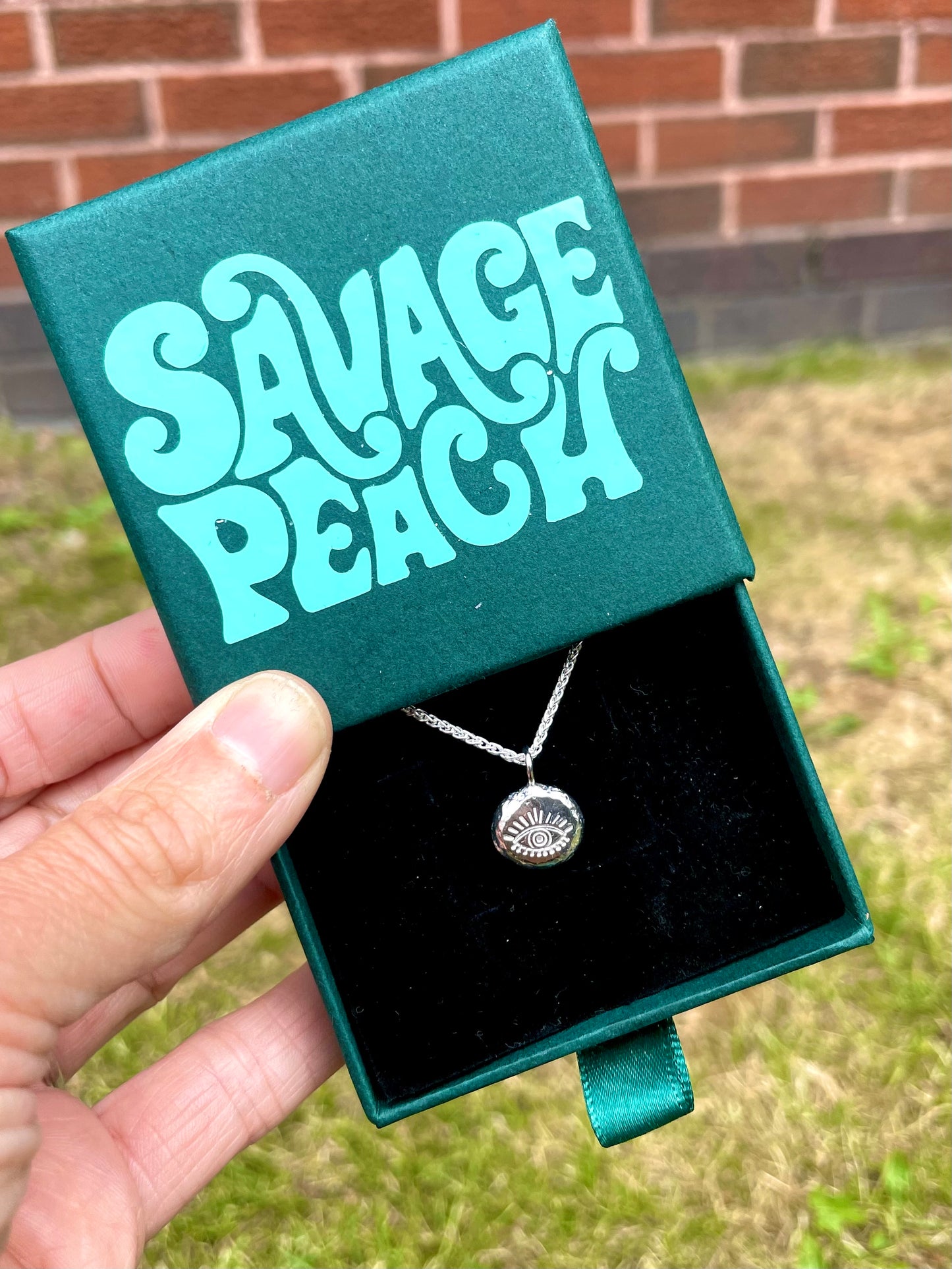 Eye | hand stamped silver pebble