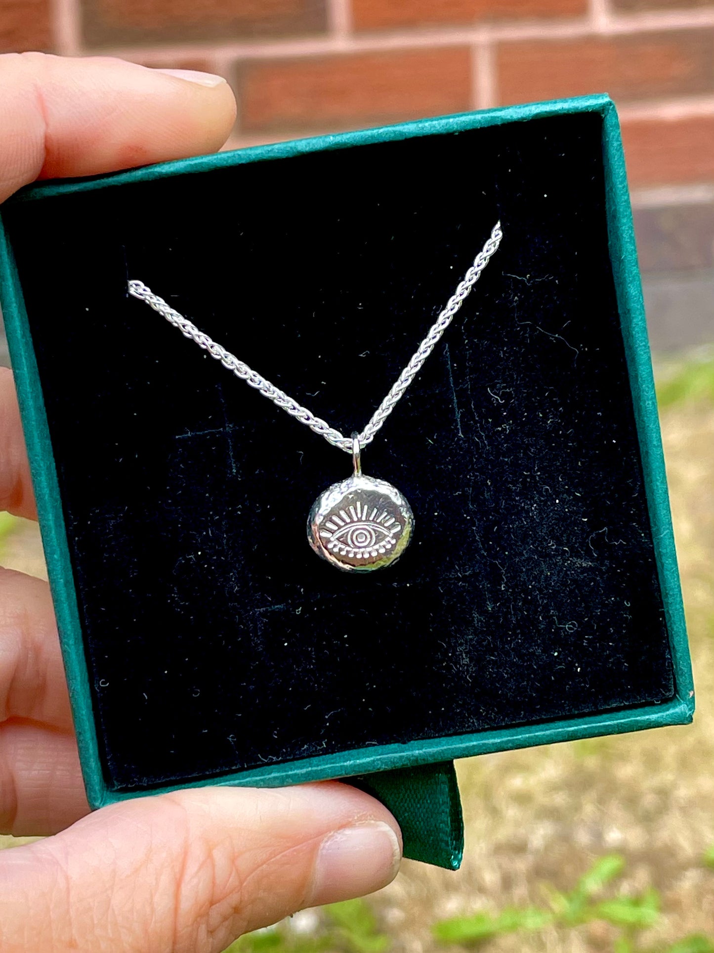 Eye | hand stamped silver pebble