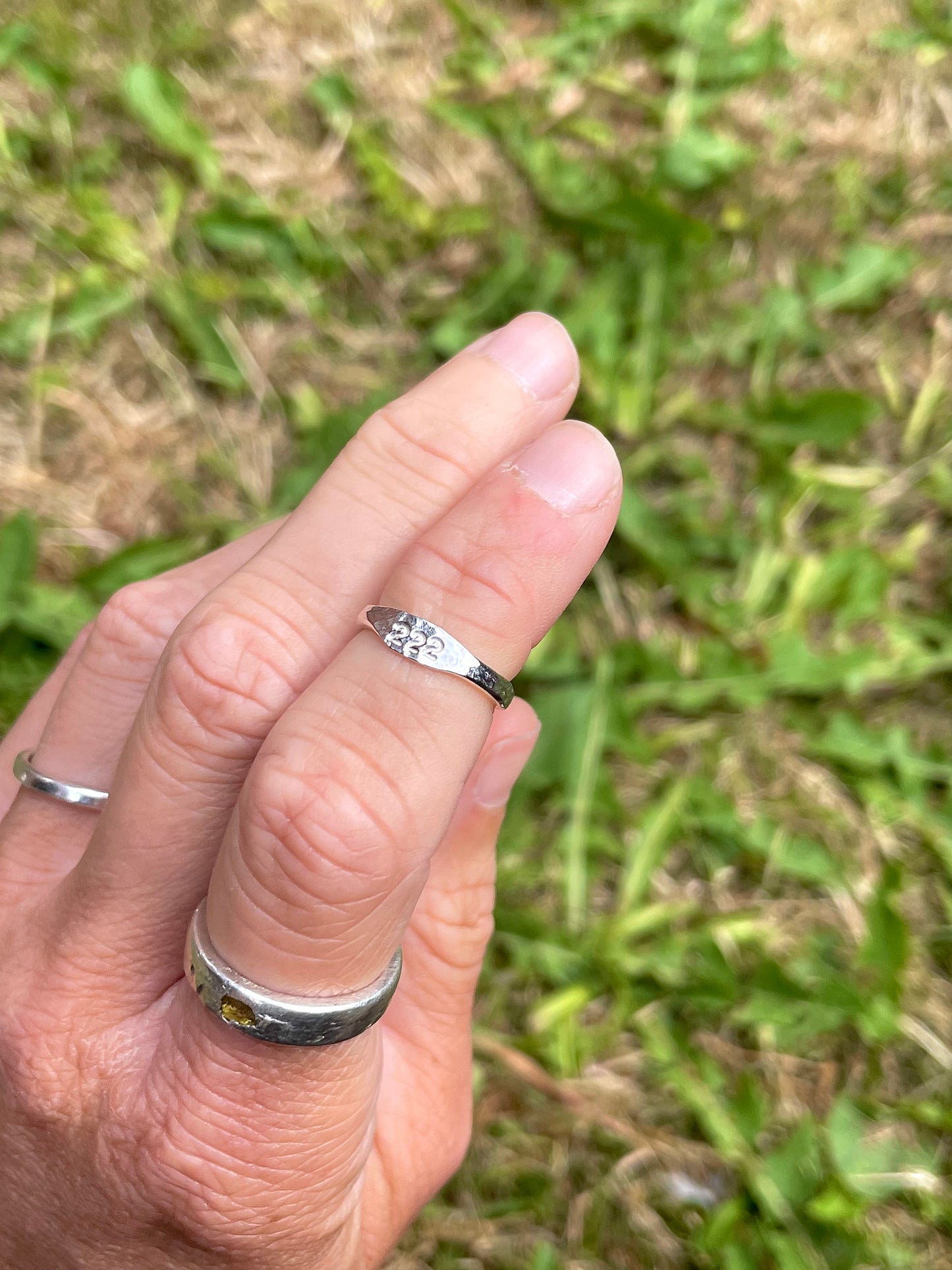 Tiny silver angel number pinky ring
