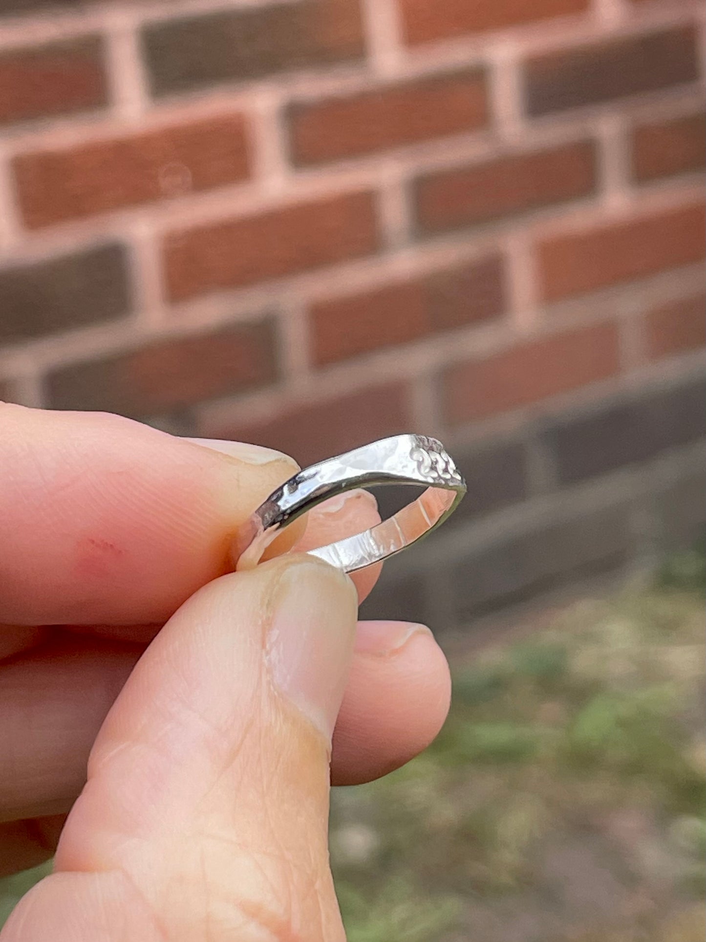 Tiny silver angel number pinky ring