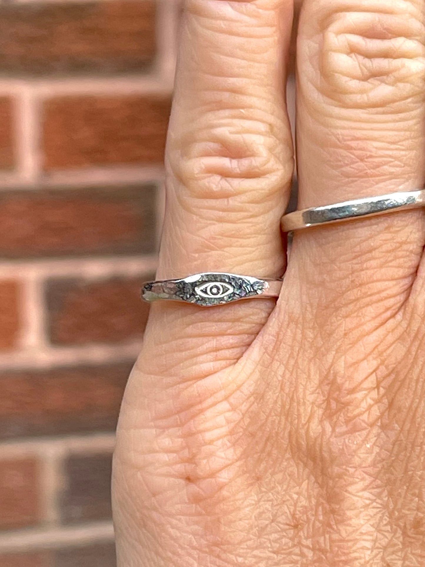 Tiny silver eye pinky ring