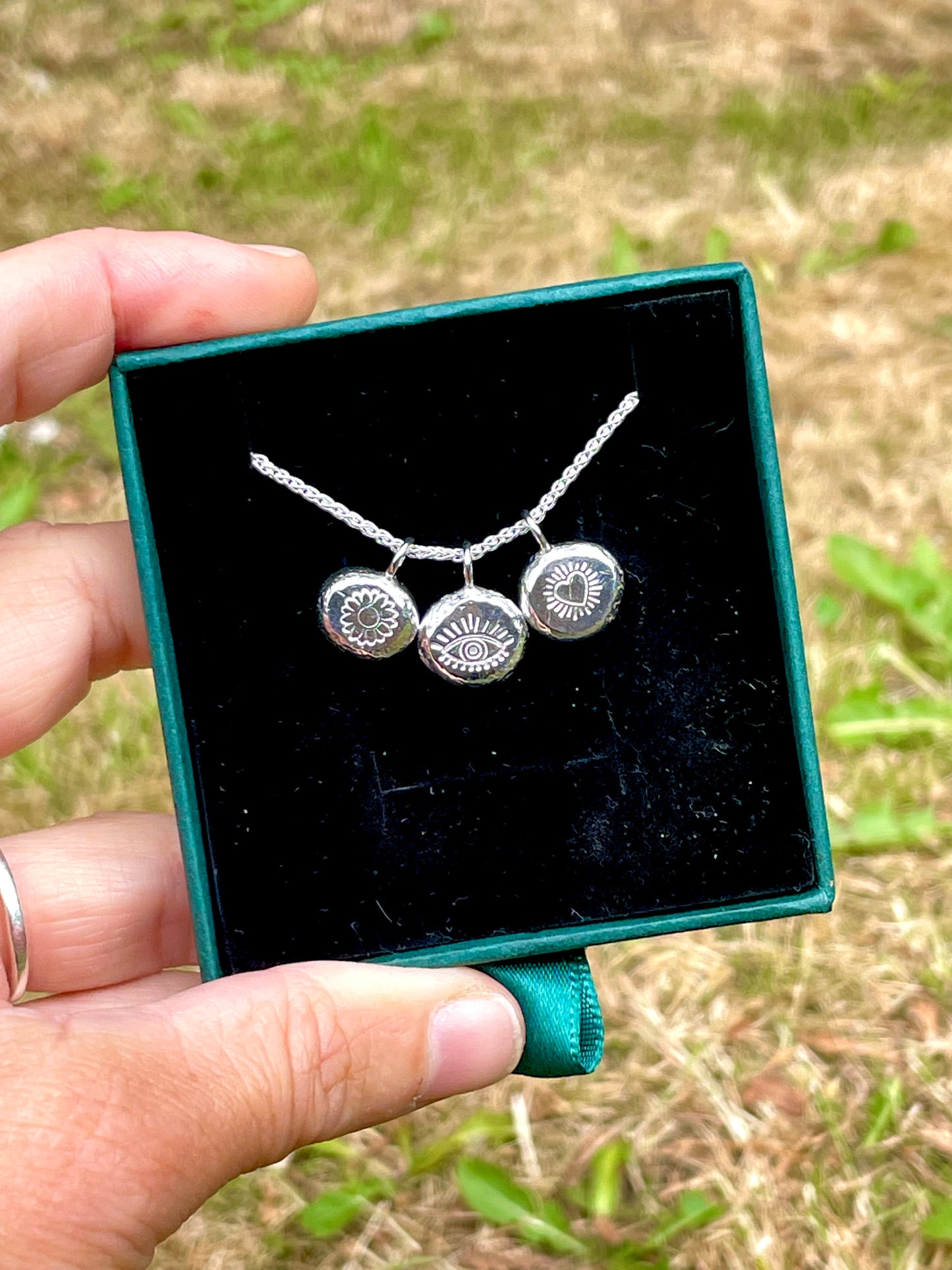 triple pebble | hand stamped silver pebble pendants