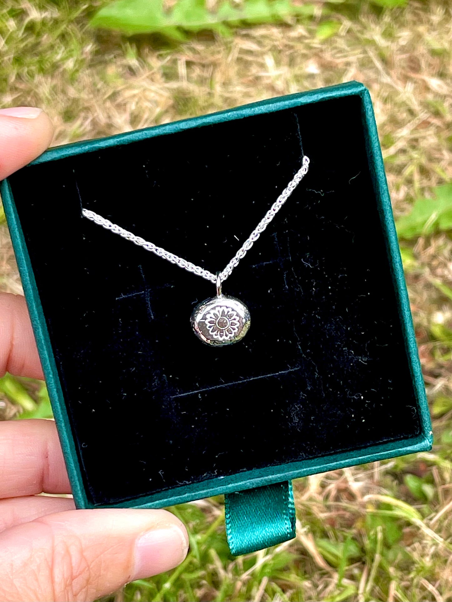 Sunflower | hand stamped silver pebble