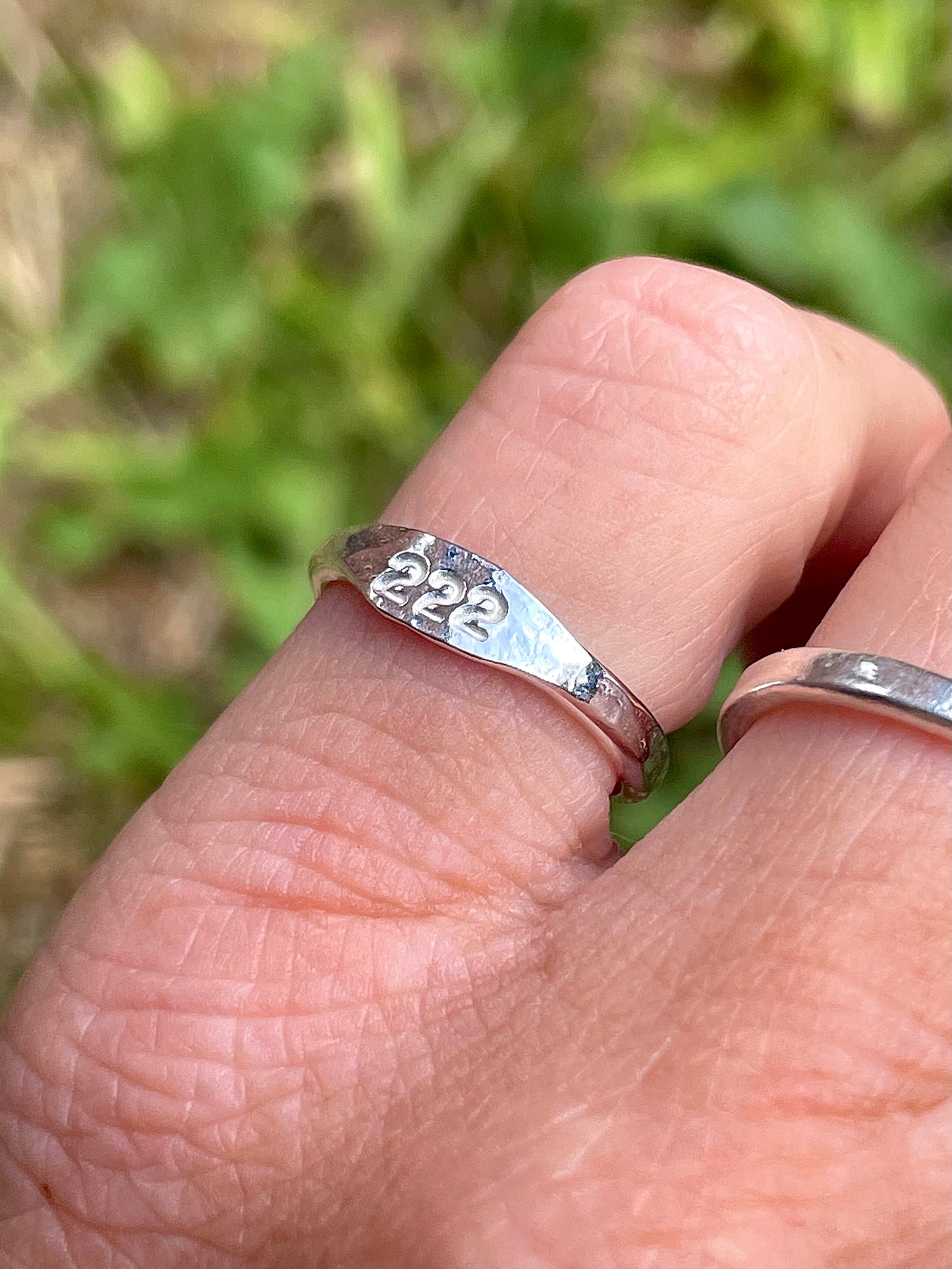 Tiny silver angel number pinky ring
