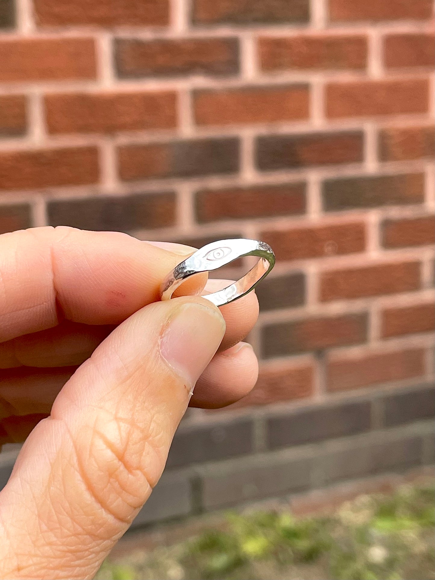 Tiny silver eye pinky ring