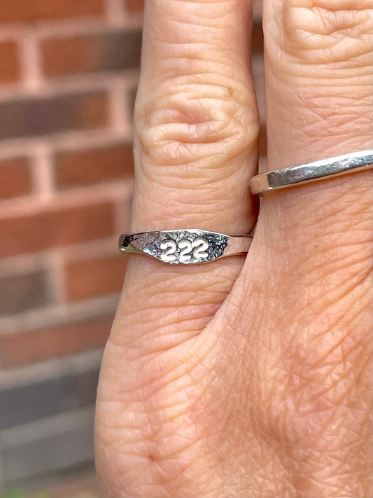 Tiny silver angel number pinky ring