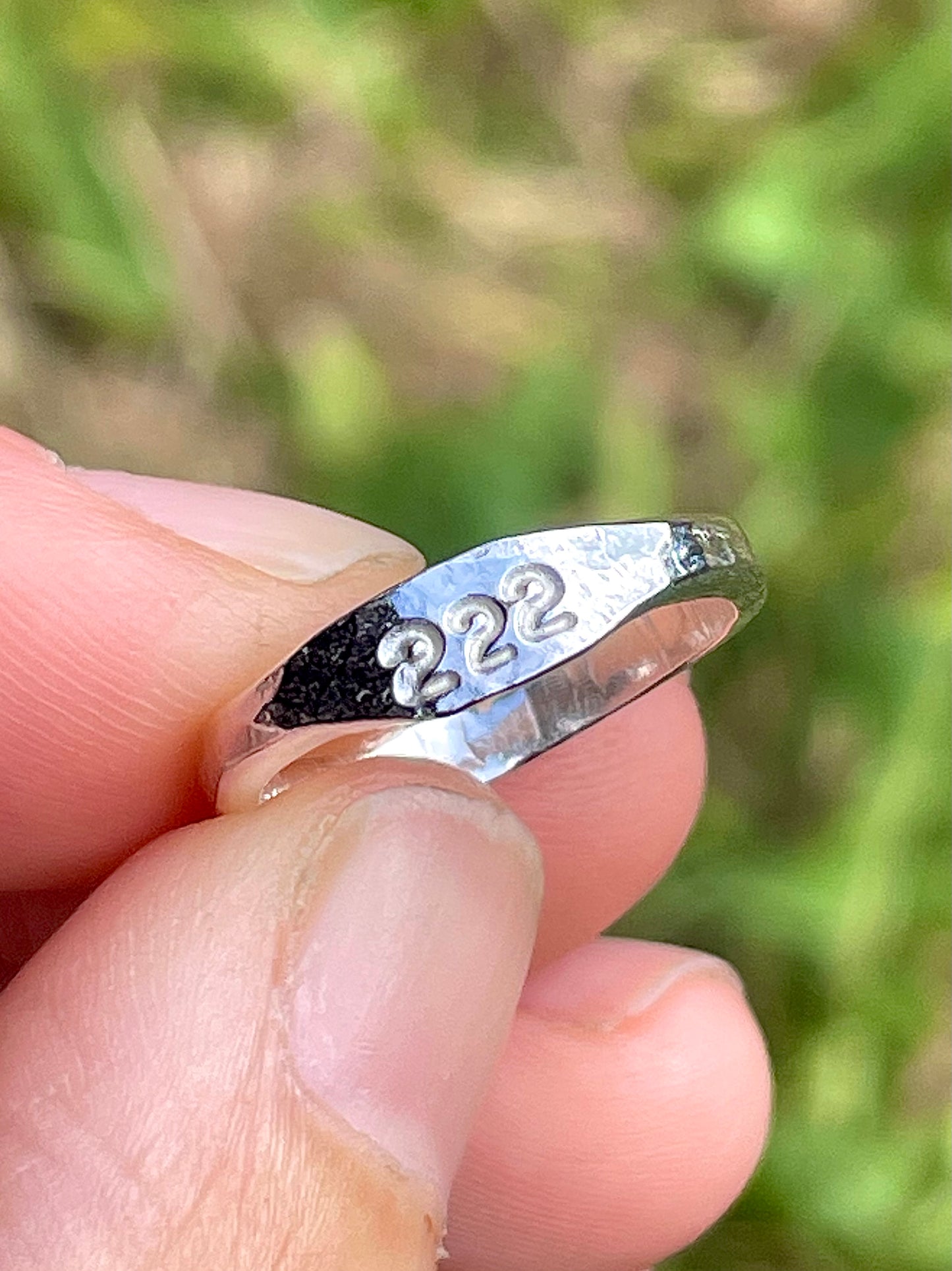 Tiny silver angel number pinky ring