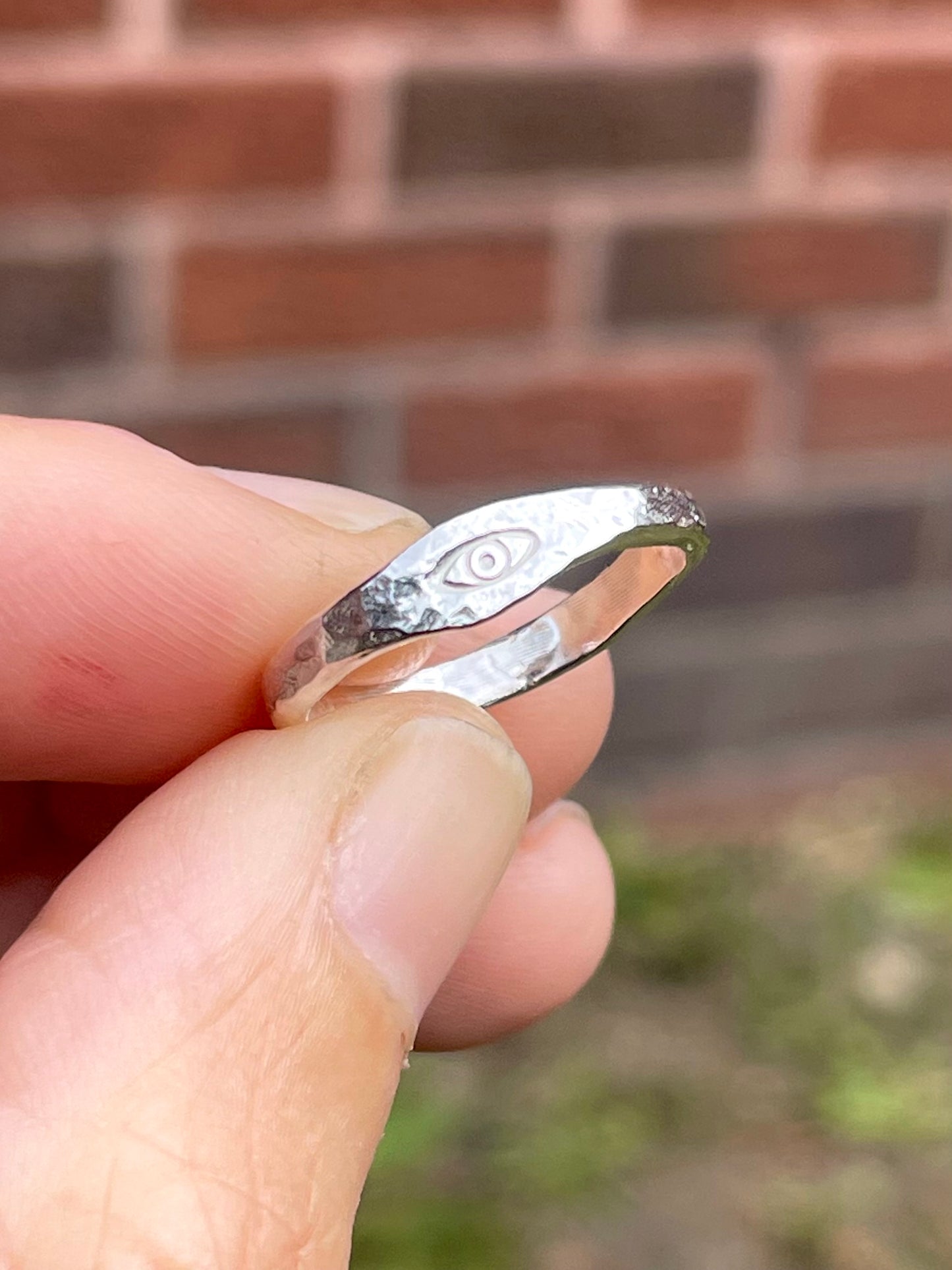 Tiny silver eye pinky ring