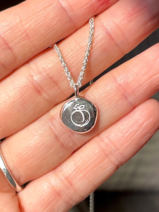peach | hand stamped silver pebble