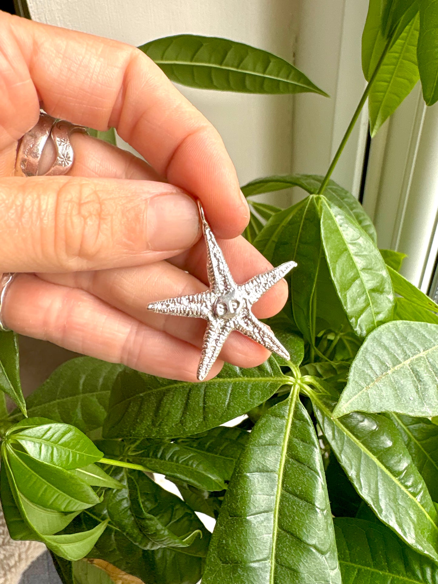 personalised silver sandcast starfish pendant