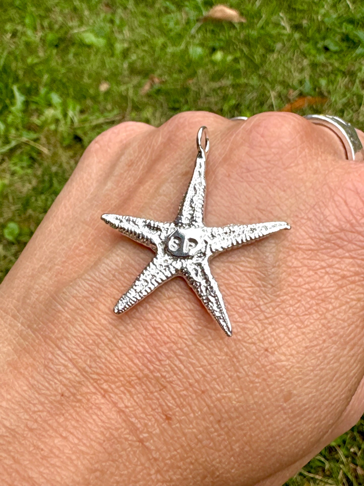 personalised silver sandcast starfish pendant
